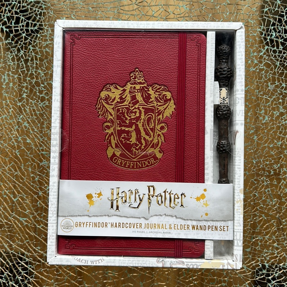 NWT. Harry Potter Gryffindor Hardcover Journal and Elderwand Pen Set.